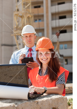 White-collar workers works on the building site White-collar workers works on the building site 9212176