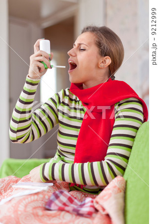 illness woman uses spray illness woman uses spray 9212999