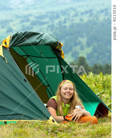 Happy female tourist Happy female tourist 9213010