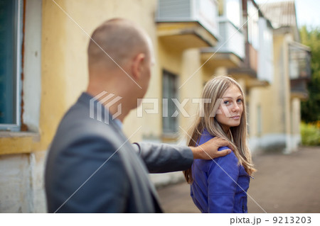 The man stops woman 9213203