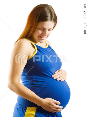 pregnant woman holding her tummy pregnant woman holding her tummy 9215104