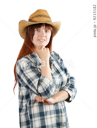 Happy pastoral woman in checkered shirt Happy pastoral woman in checkered shirt 9215182