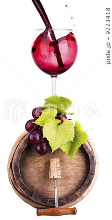 grapes on a barrel with corkscrew and wine glass grapes on a barrel with corkscrew and wine glass 9223418