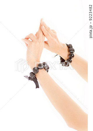 フラダンスの特徴的な手で星を象るポーズの写真素材