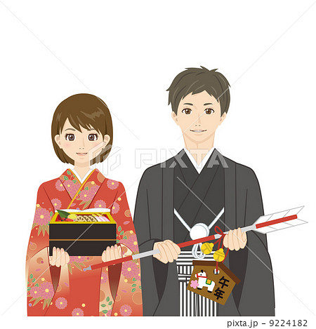 お節料理と破魔矢をもつ男女 9224182