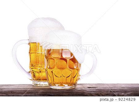 Beer glass on wooden table background 9224829