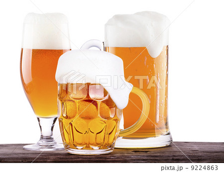 Beer glass on wooden table background 9224863