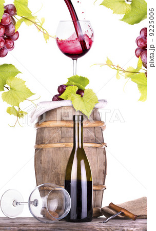 grapes on a barrel with corkscrew and wine glass 9225006