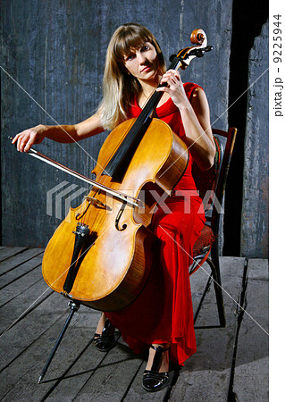 Beautiful cello musician Beautiful cello musician 9225944
