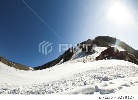 Bright sun in winter mountains 9229127