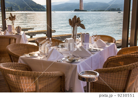 Luxurious restaurant with tables on pier 9230551