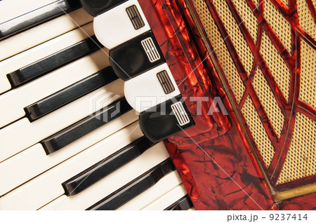 Red accordion, close up Red accordion, close up 9237414