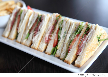Club sandwich with on wood background 9237980