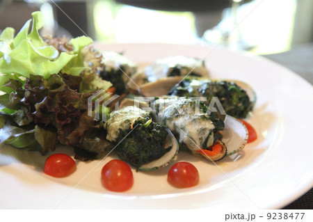 Baked mussels with cheese Baked mussels with cheese 9238477