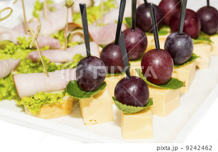 canape with meat vegetables and seafood canape with meat vegetables and seafood 9242462