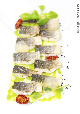 baked black cod fish on a white background in the restaurant baked black cod fish on a white background in the restaurant 9243349