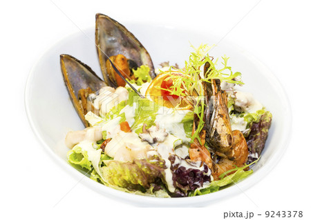 seafood salad on a white background in the restaurant 9243378