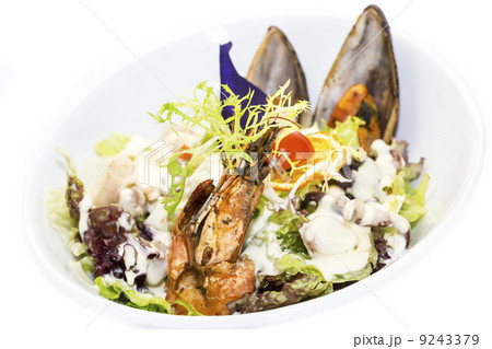 seafood salad on a white background in the restaurant 9243379