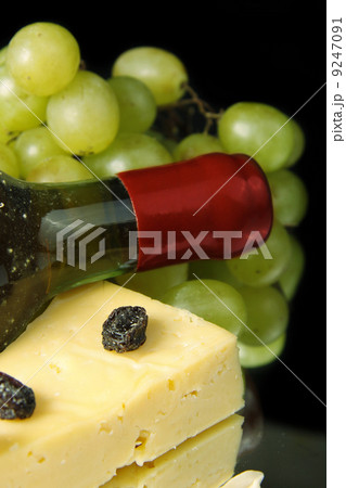 Grape wine with cheese on black Grape wine with cheese on black 9247091