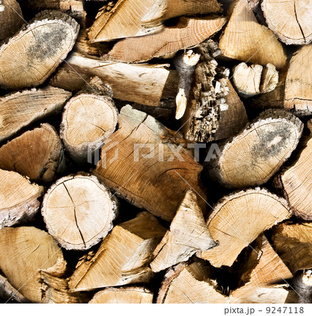 Pile of wooden logs background 9247118