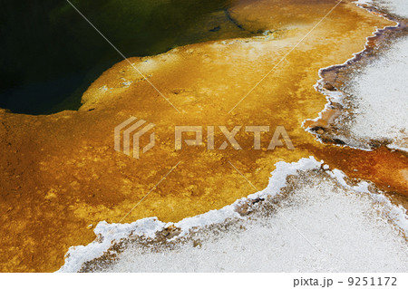 Detail of colourful water mineral deposits and rock formations from Midway Geyser, in Yellowstone National Park. Detail of colourful water mineral deposits and rock formations from Midway Geyser, in Yellowstone National Park. 9251172