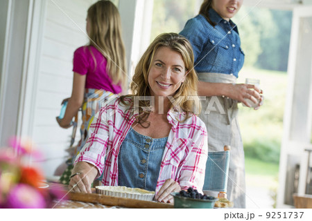 A family party in a farmhouse in the country in New York State. Adults and children. A family party in a farmhouse in the country in New York State. Adults and children. 9251737