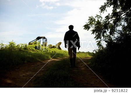 A farmer working in his fields in New York State, USA. A farmer working in his fields in New York State, USA. 9251822