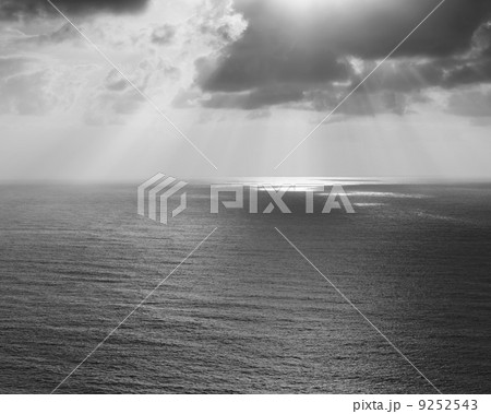 Shafts of sunlight shining through cloud and a view over the Pacific Ocean, at Manzanita, Oregon. Shafts of sunlight shining through cloud and a view over the Pacific Ocean, at Manzanita, Oregon. 9252543