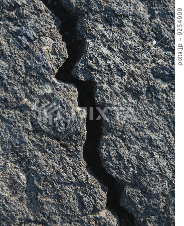 A Lava Field, With Black Solidified Rock Surface, With Fissures.  9254909