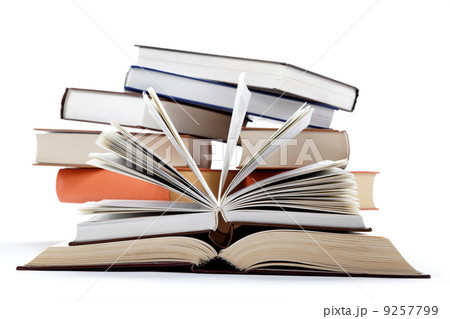 A stack of books on a white background. A stack of books on a white background. 9257799