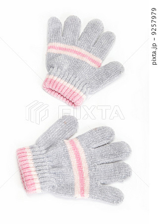Gray and pink woolen gloves, isolated on white background. 9257979