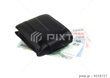 Wallet put on Thai banknote Wallet put on Thai banknote 9258727