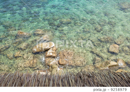 Rocks in the ocean top view 9258979