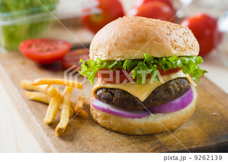 hamburger fast food with plenty of raw materials on the backgrou hamburger fast food with plenty of raw materials on the backgrou 9262139
