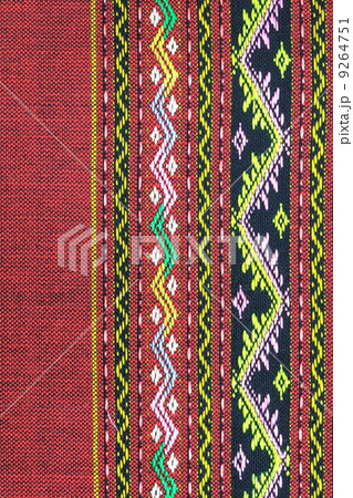 Thai silk red fabric pattern background 9264751