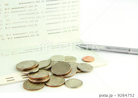 Coins on account passbook with pen ,Thai bath Coins on account passbook with pen ,Thai bath 9264752