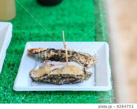 Oyster roast with salt near Miyajima shrine at Hiroshima, Japan 9264753