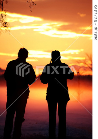 People watching winter sunset 9272395