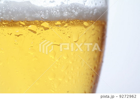 Pouring Beer into glass on white background Pouring Beer into glass on white background 9272962