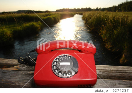 hotline phone in beautiful landscape outside 9274257
