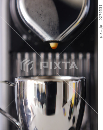Espresso pouring into a cup 9276551