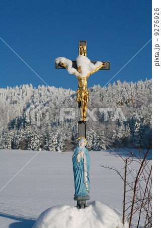jesus cross in winter landscape 9276926