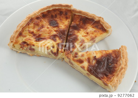 Fresh baked slice of quiche lorraine on a plate Fresh baked slice of quiche lorraine on a plate 9277062