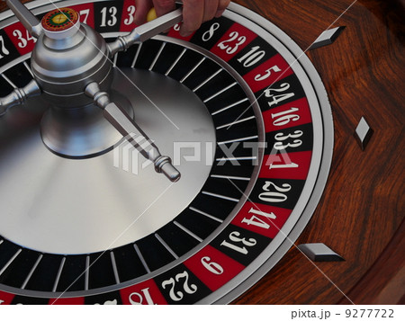 playing with chips at a roulette table 9277722