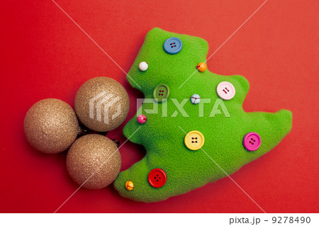 Toy Christmas Tree On Red Background Toy Christmas Tree On Red Background 9278490