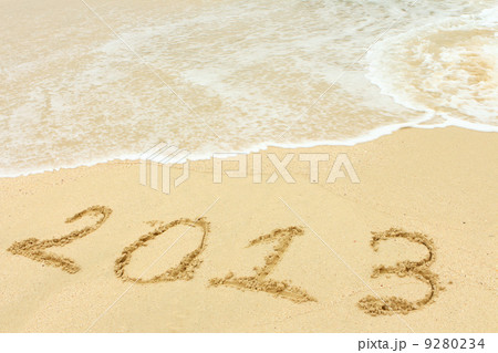 2013 written in sand on beach 2013 written in sand on beach 9280234