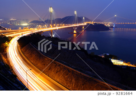 highway and Ting Kau bridge at night 9281664