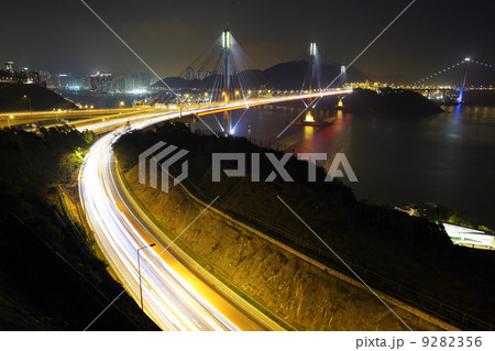 highway and Ting Kau bridge at night 9282356