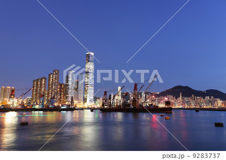 Hong Kong harbour with working ship 9283737