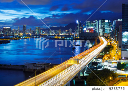 Hong Kong downtown with highway at night Hong Kong downtown with highway at night 9283776